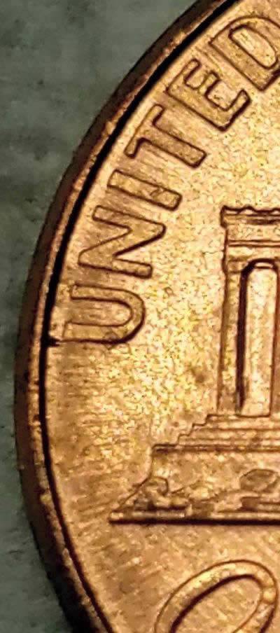2004-P-Lincoln-Split-Planchet-Top-Of-United-On-The-Reverse?